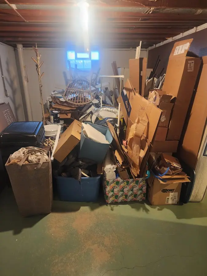 Roll-off dumpster container at job site for 15 Yard Dumpster Rental in Holyoke